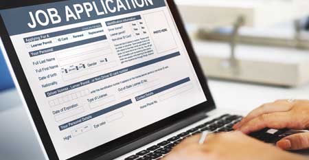 A job application open on a laptop