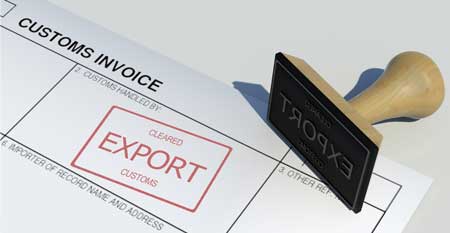 An export stamp lies on top of an invoice