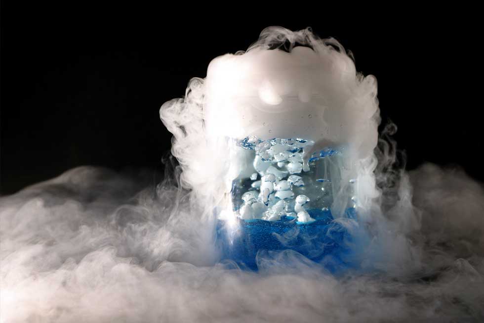 A beaker shows ice turning into a vapor as it boils